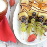 Kids' appetites dip during the hot weather & understandably so! Give them refreshing nutrition with these healthy, cooling & colorful fruit skewers for summer!