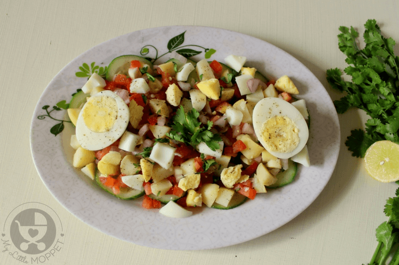 Boiled eggs are bursting with nutrition, but may not always be welcomed by kids! Try out this Indian style egg salad that's also loaded with veggies!