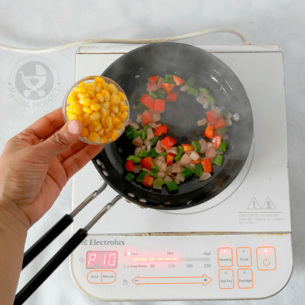 Now add corn kernels to the pan